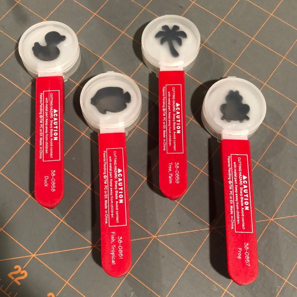 4. Sizzix Paddle Punch Positionable hand Punch dies